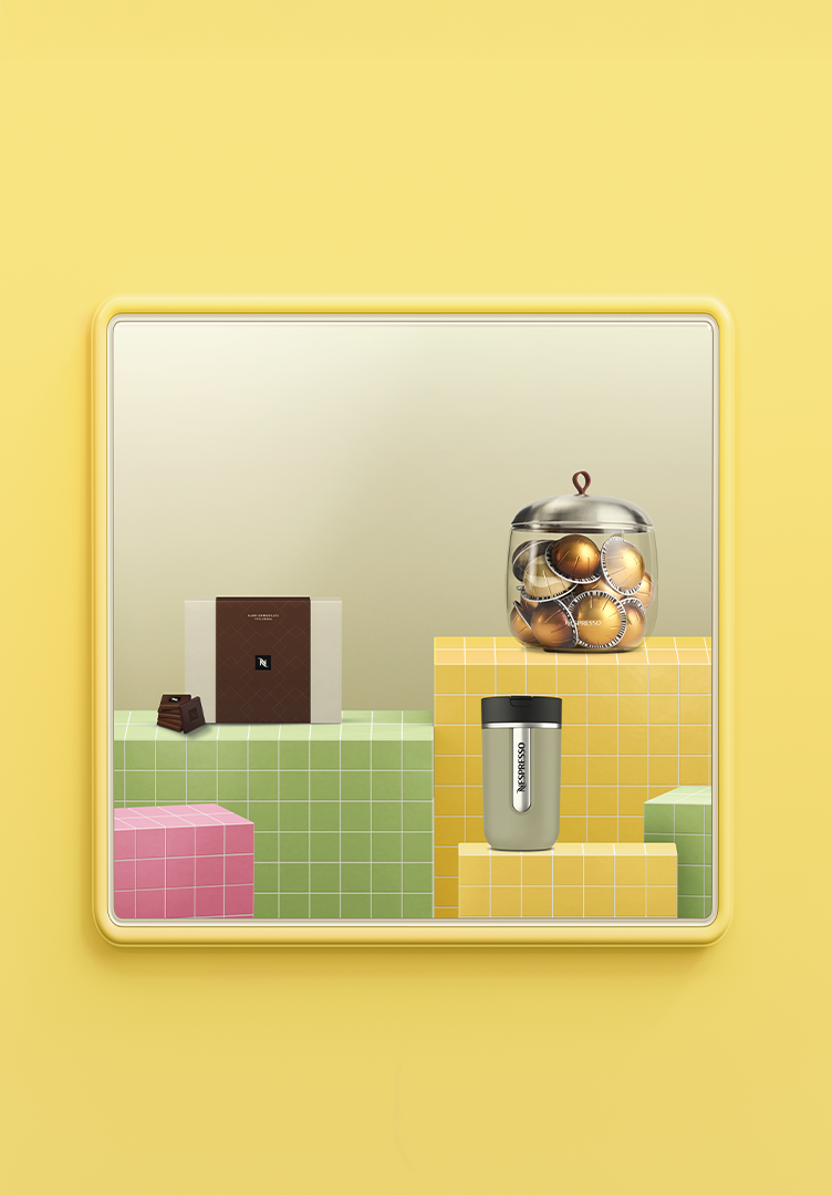 Accessories such as Dark Square chocolate, Lume Mia and Travel Mug on shelves